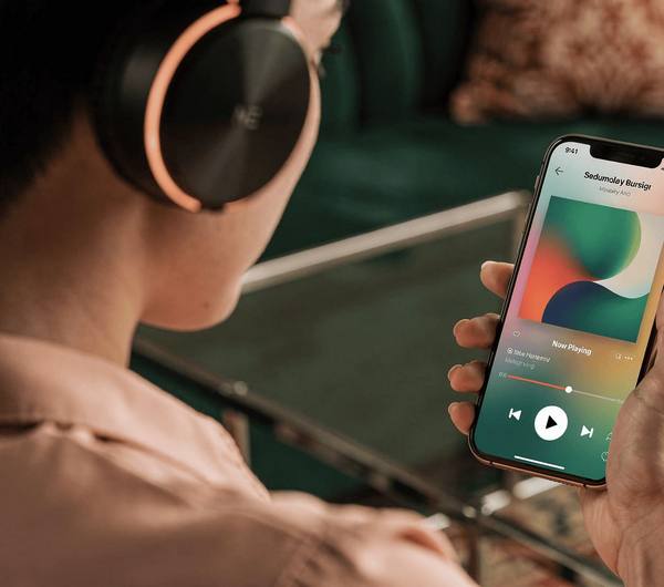 modern music streaming on smartphone with headphones and colorful app interface